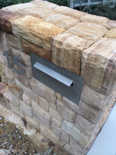 Sandstone house number: stonework letterbox with local natural materials by Central Coast landscape solutions experts